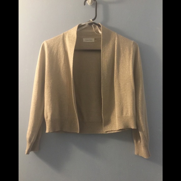 Calvin Klein Sweaters - Calvin Klein gold sparkle shrug